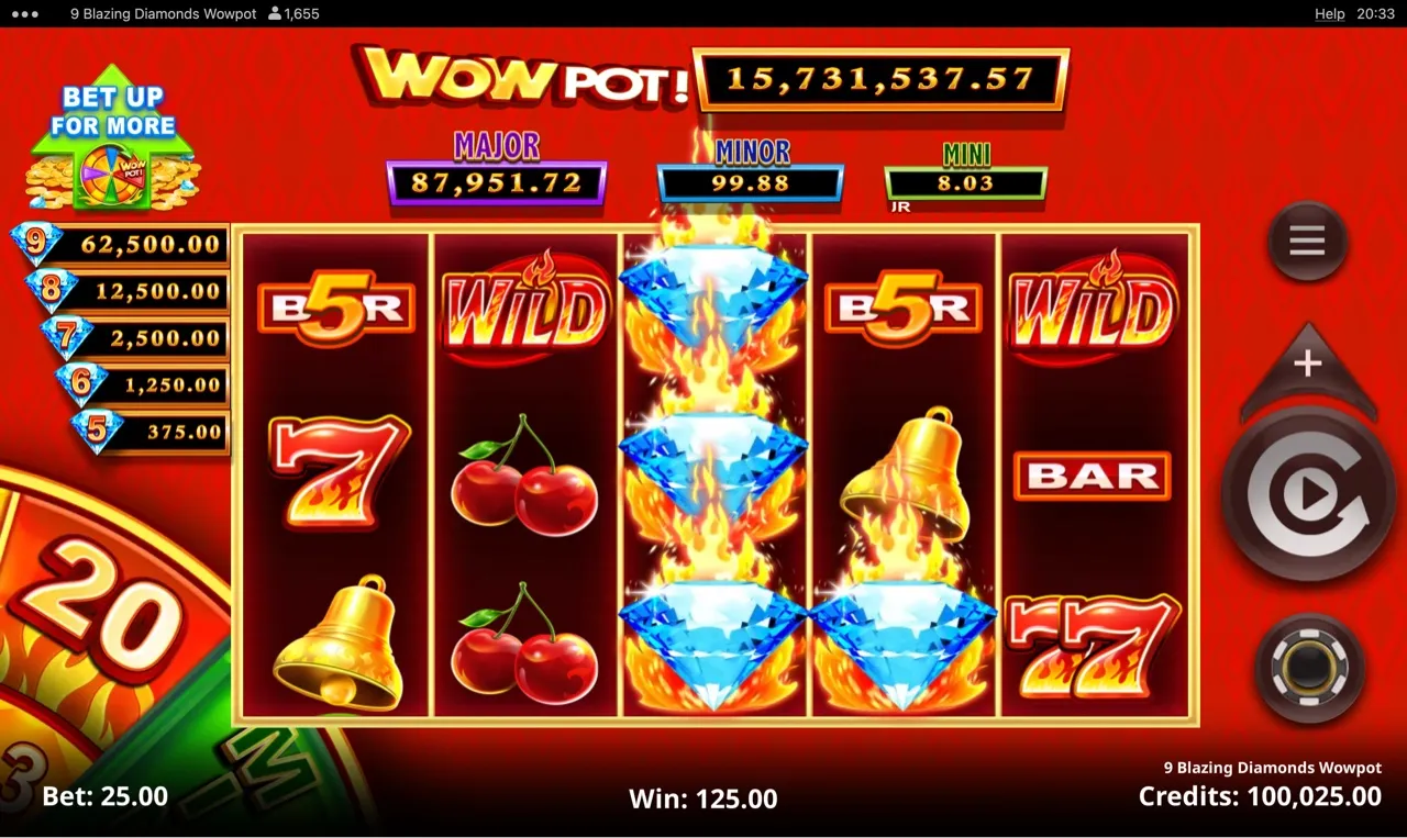 Blazing diamond column with WILD on adjacent reel paying 125 credits