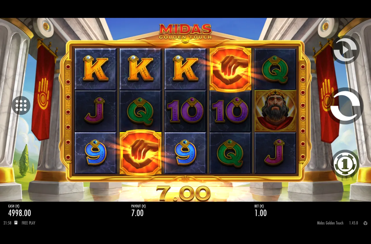 Cash field at 4,998 with golden-hand wilds and stacked Kings on the grid